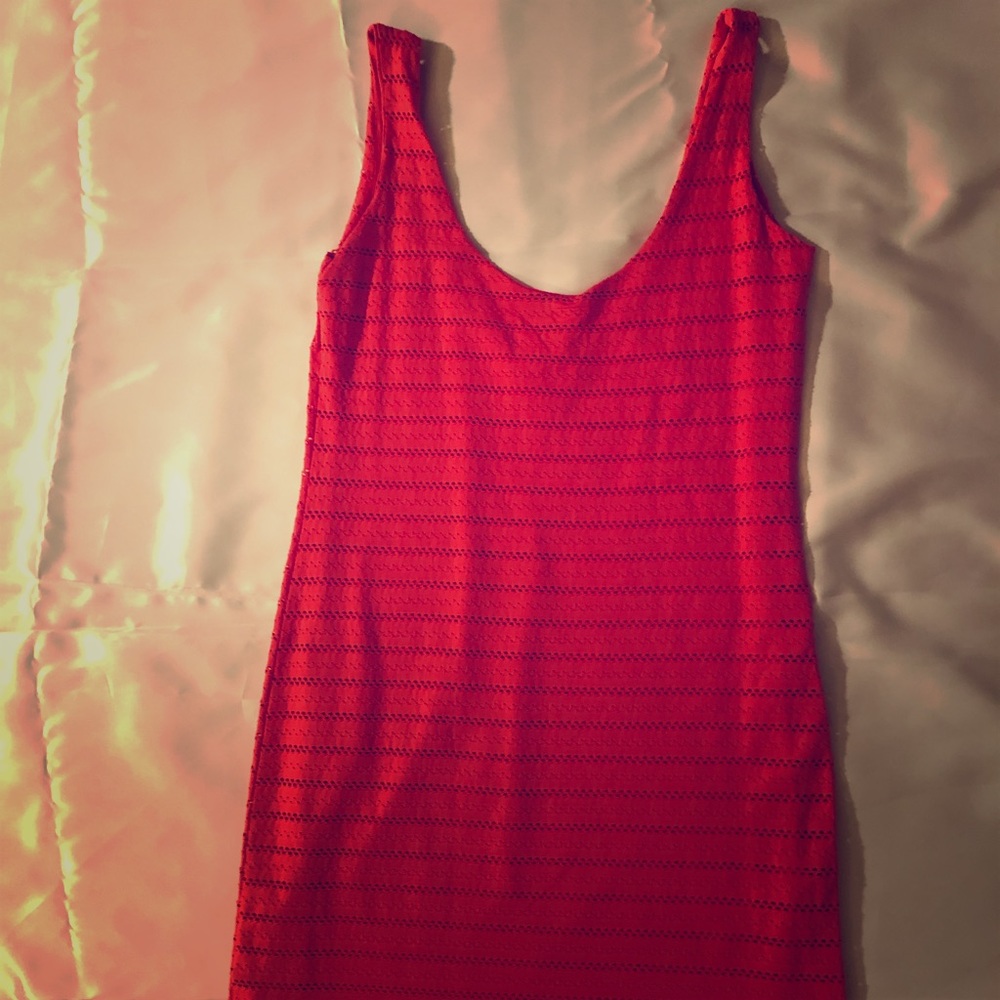 Textured coral dress with turquoise necklace